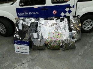 Tres detinguts a Figueres per tenir 43 quilos de marihuana en un pis del centre