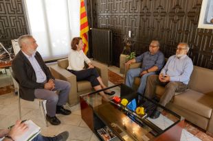 Madrenas discuteix la realitat hondurenya de Girona amb el Padre Melo