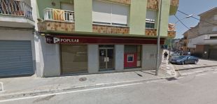 Atraquen a punta de pistola una oficina bancària de la Cellera de Ter