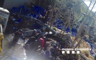 Tres detinguts que intentaven recuperar haixix d'un camió accidentat en una riera a Maçanet de la Selva