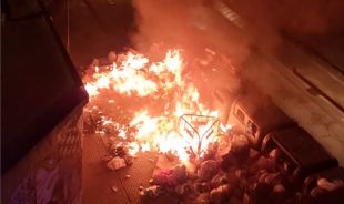 Investiguen els autors dels nou incendis a contenidors a Salt el diumenge