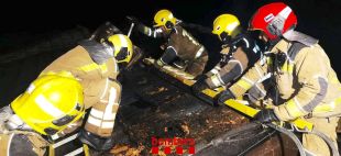 Crema totalment una casa de fusta a Ogassa