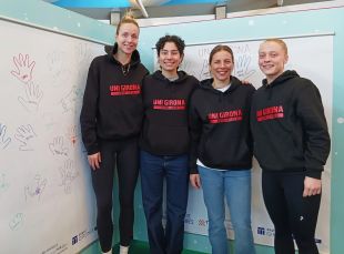 Jugadores de l’Uni Girona se sumen a la campanya solidària de l’Espai Gironès