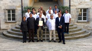 L'acte d'entrega que representants dels gremis de carnissers i flequers