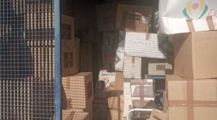 La droga acumulada en caixes dins d'una garjola