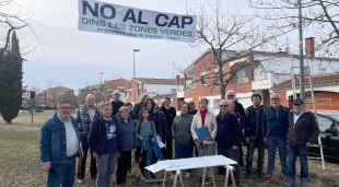 Els veins en un acte de recollida de signatures
