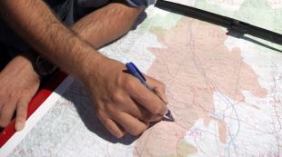 Un Bomber mostrant la zona afectata © ACN