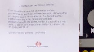 Un dels cartells en un parquímetre de Girona