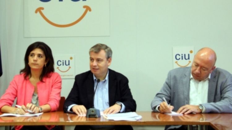 Els parlamentaris de CiU Montse Surroca, Jordi Xuclà i Joan Bagué © ACN