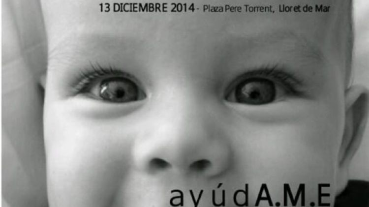 Cartell amb l'Aran Molina, l'infant que pateix AME © ACN