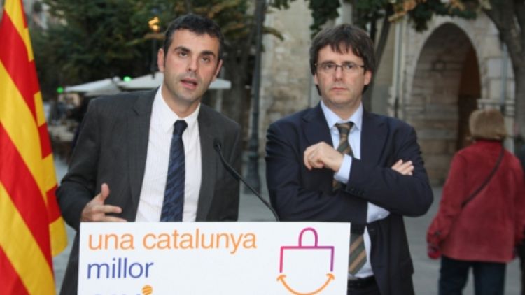 El cap de llista de CiU, Santi Vila, i el número 6, Carles Puigdemont, han fet propostes de comerç a la Rambla de Girona. ACN