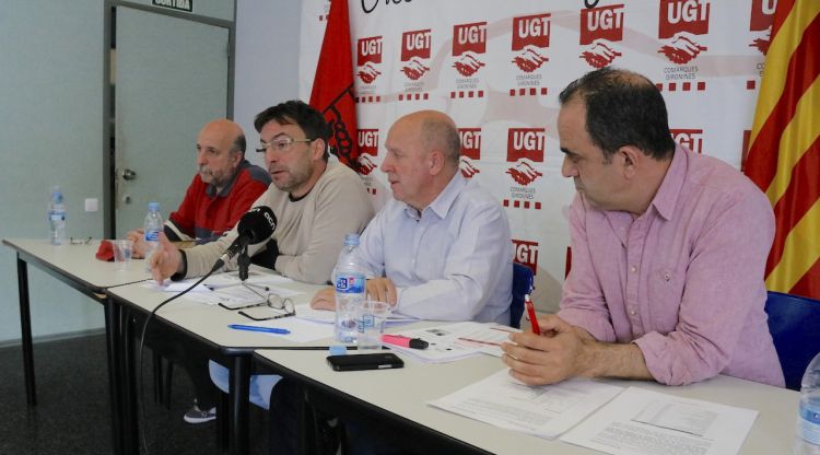 Representants de la UGT a comarques gironines i de l'AMIC aquest matí. ACN