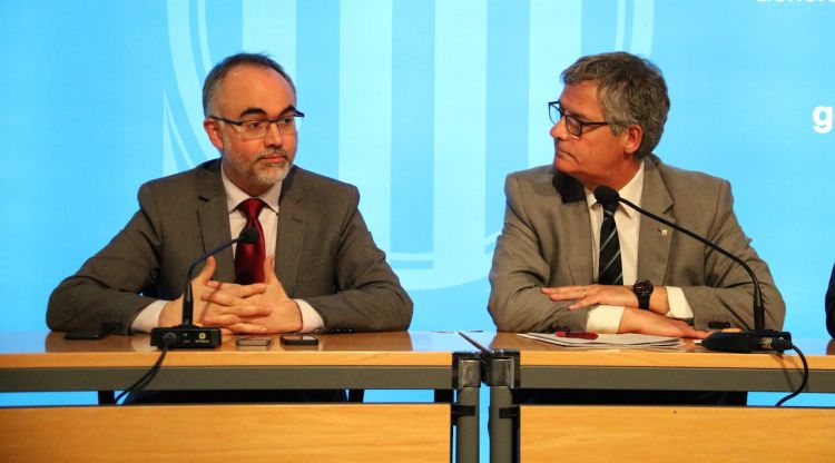 El secretari d'Universitats i Recerca, Arcadi Navarro (esquerra) i el delegat del Govern a Girona, Eudald Casadesús. ACN