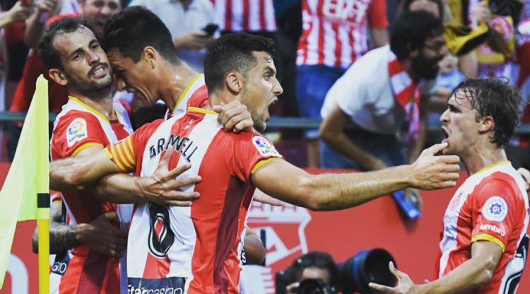 Jugadors del Girona celebren un gol en el primer partit de la lliga. Girona FC