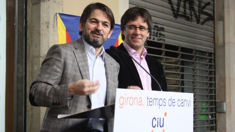 Oriol Pujol ha presidit la inauguració del local acompanyat per Carles Puigdemont © M. Estarriola