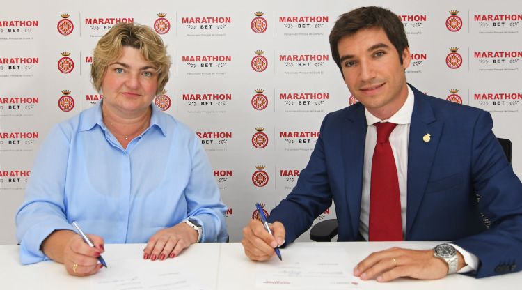 el CEO del Girona FC, Ignasi Mas-Bagà, i Natalia Zavodnik, CEO de Marathonbet