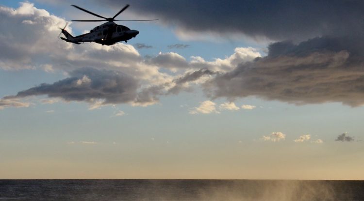 Un helicòpter de Salvament Marítim que ha participat en les tasques de rescat del menor i el monitor a Tamariu. ACN