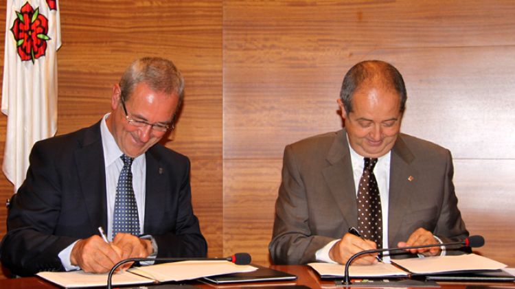 Carles Pàramo (esquerra) amb el conseller d'Interior, Felip Puig © AG