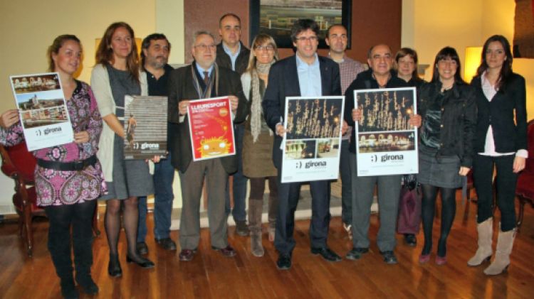 L'alcalde de Girona, Carles Puigdemont, acompanyat de representants del comerç a la ciutat © ACN