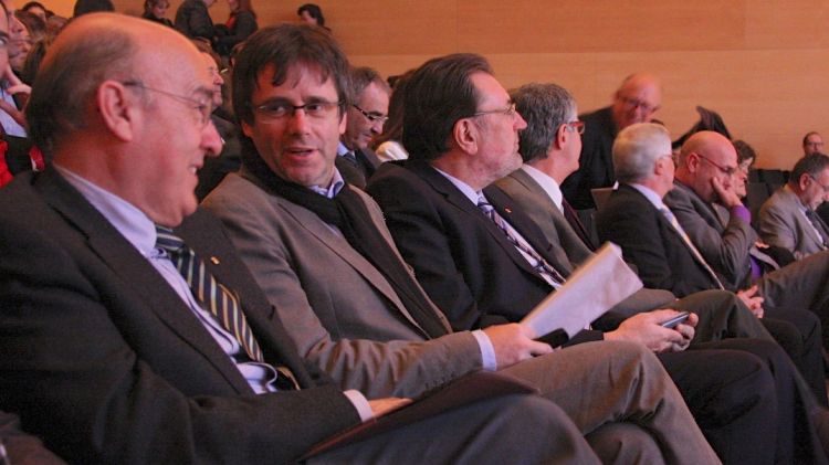 Boi Ruiz, Carles Puigdemont i Josep Lluís Cleries aquest matí a l'Auditori de Girona © ACN
