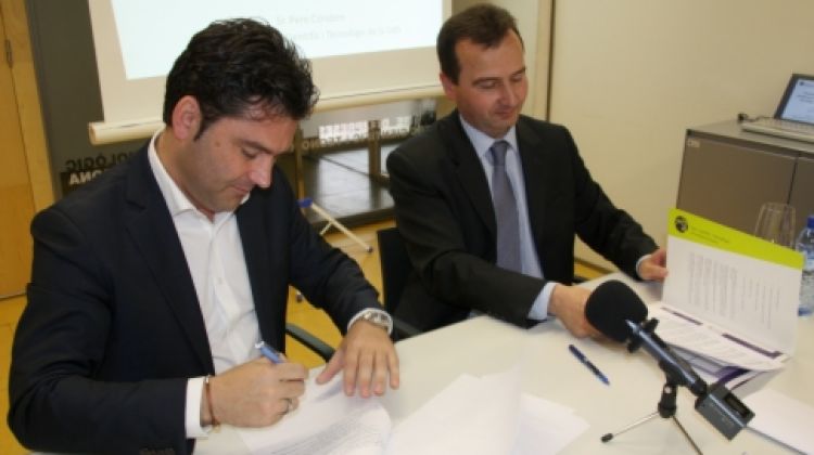 A l'esquerra, el director general d'IDODI, Marc Vidal, amb el director del PCT de la UdG, Pere Condom © ACN