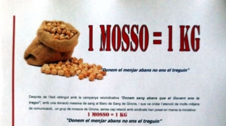 Cartell que difon la campanya de recollida d'aliments © ACN