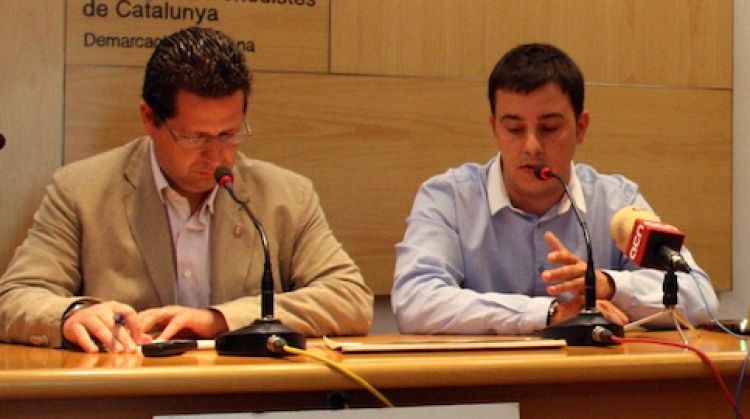 El director del seminari Marca Ciutat, Pau Canelta (dreta), i l'alcalde de Torroella de Montgrí, Jordi Cordón © ACN