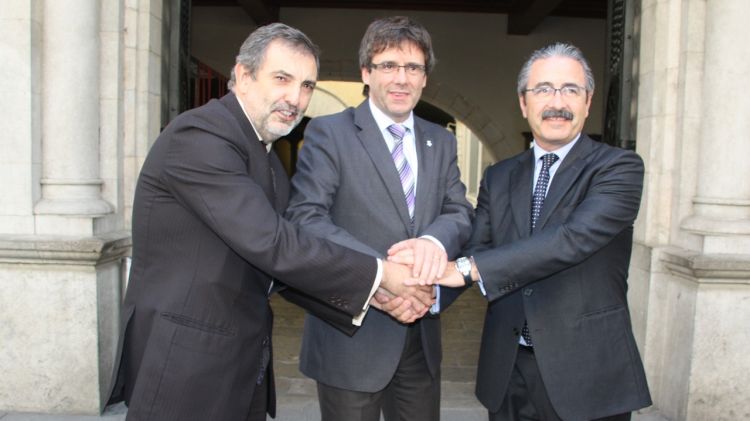D'esquerra a dreta: Luis Miguel Gilpérez, Carles Puigdemont i Kim Faura © ACN